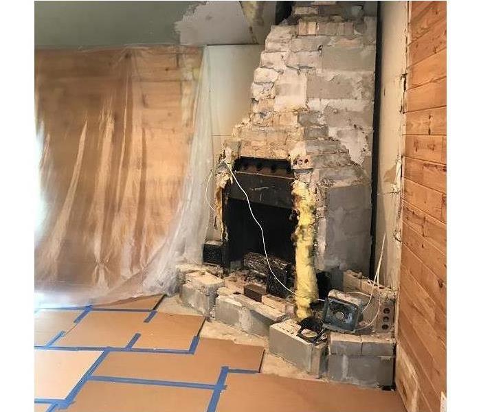 Fireplace with damages.