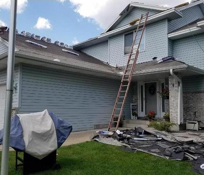 Roof getting repaired.